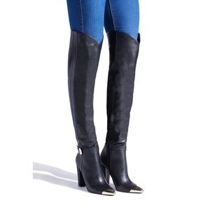 Over-the-knee Black leather heeled boots
